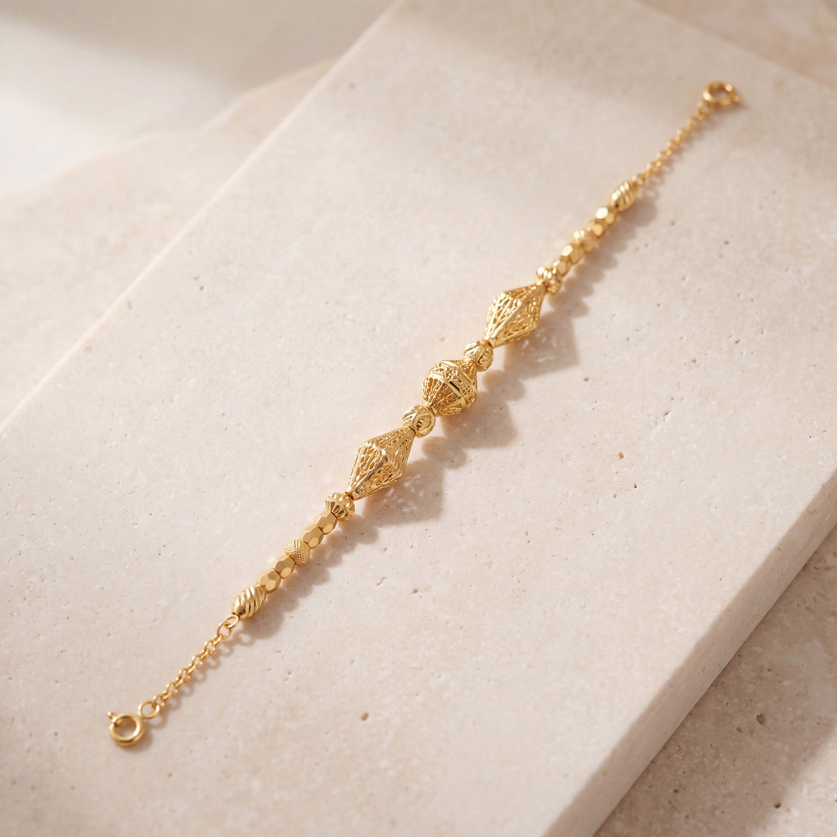 RP Beads & Ball Bracelet (D141) on travertine