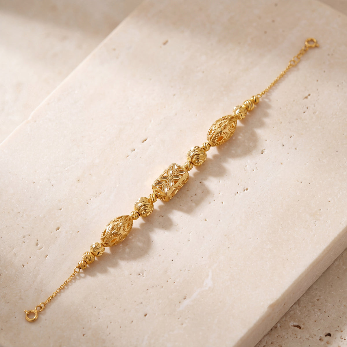 RP Beads & Ball Bracelet (D32) on travertine