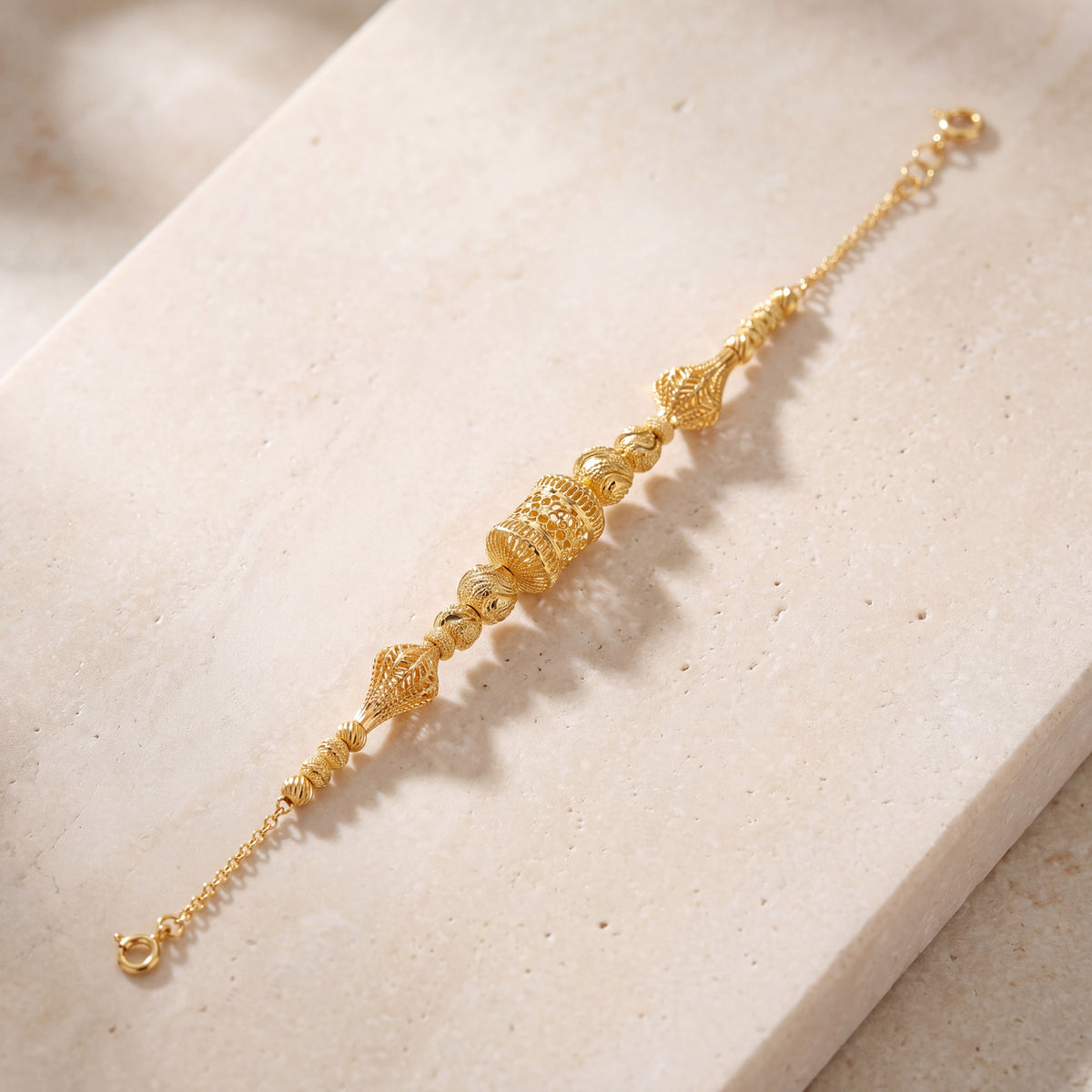 RP Beads & Ball Bracelet (D36) on travertine