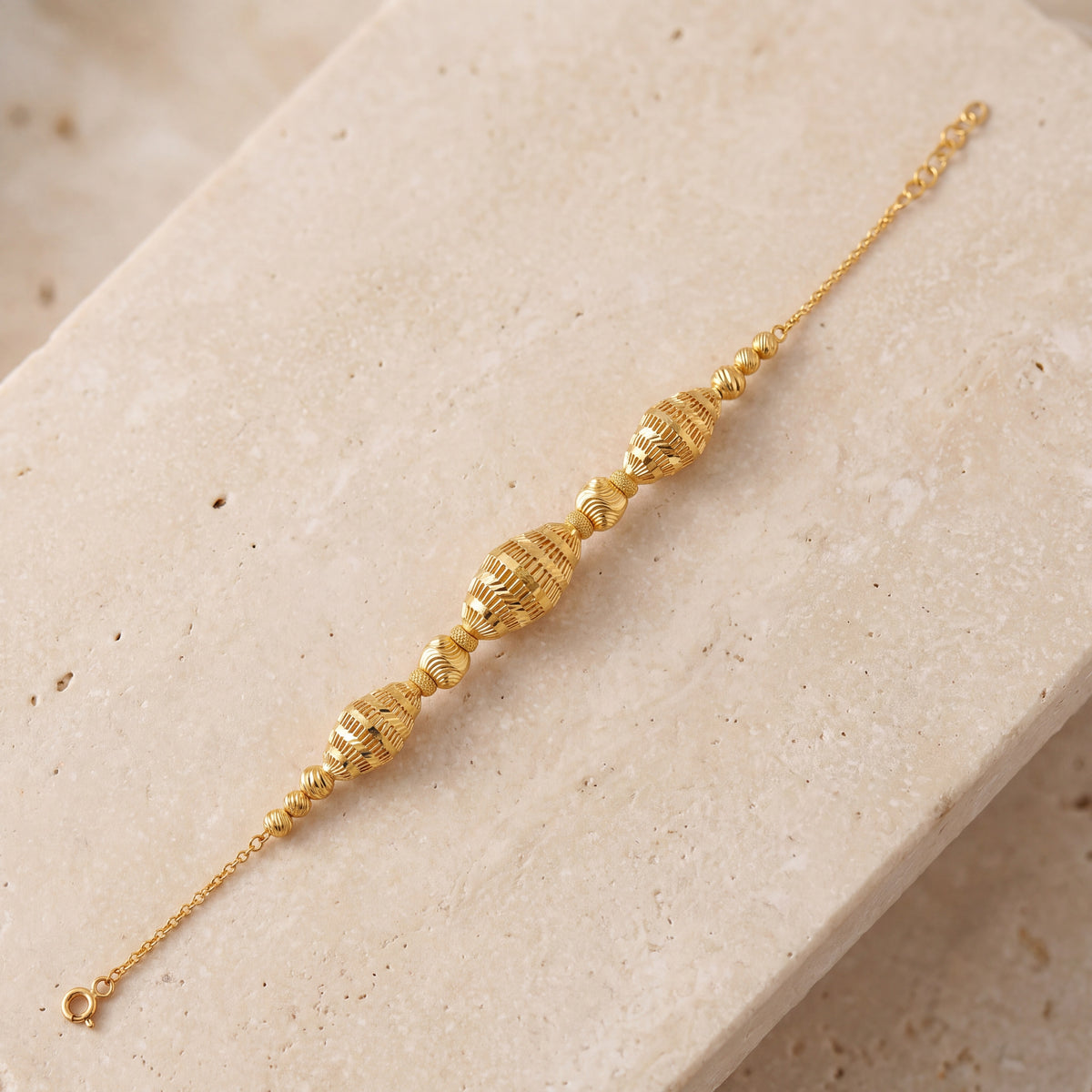 RP Beads & Ball Bracelet (D37) on travertine