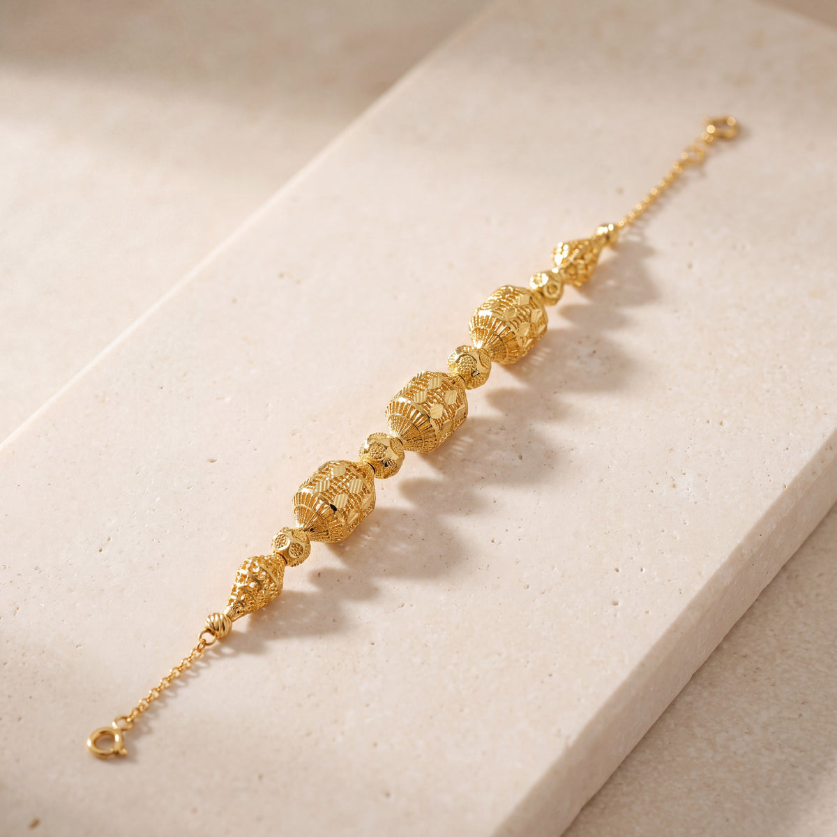 RP Beads & Ball Bracelet (D40) on travertine