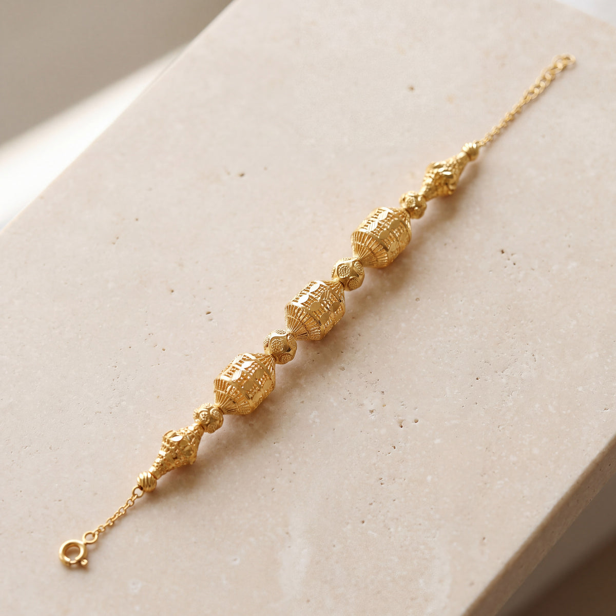 RP Beads & Ball Bracelet (D42) on travertine