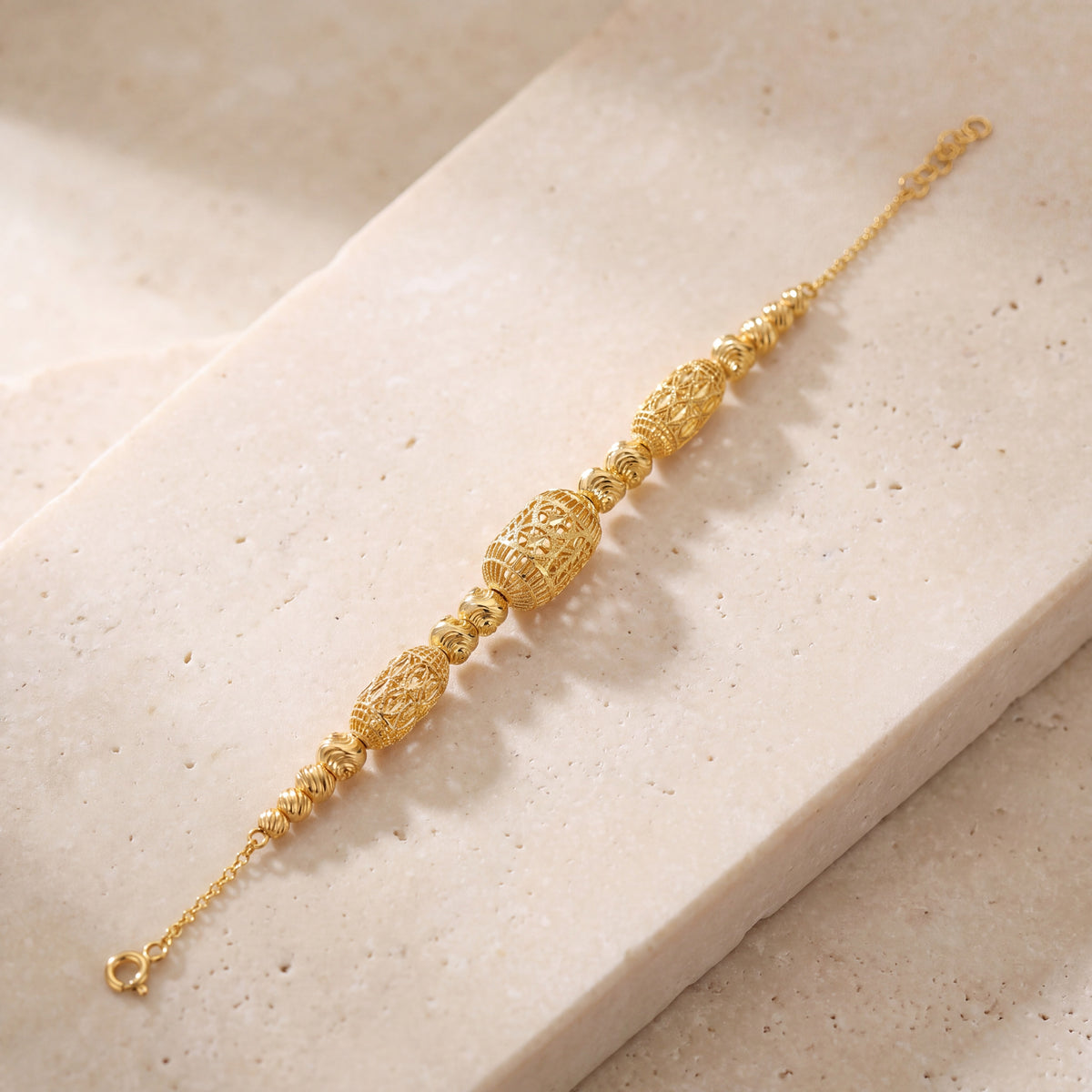 RP Beads & Ball Bracelet (D49) on travertine