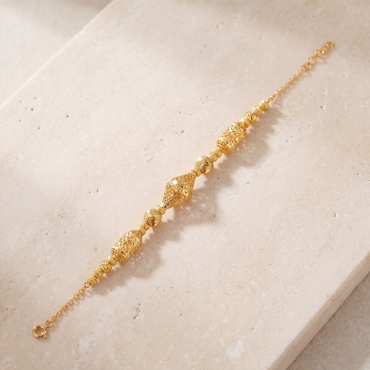 RP Beads & Ball Bracelet (D50) on travertine
