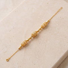 RP Beads & Ball Bracelet (D57) on travertine