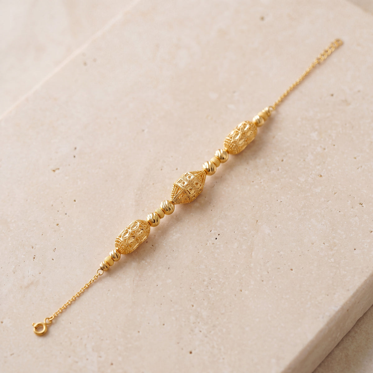 RP Beads & Ball Bracelet (D57) on travertine