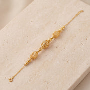 RP Beads & Ball Bracelet (D60) on travertine