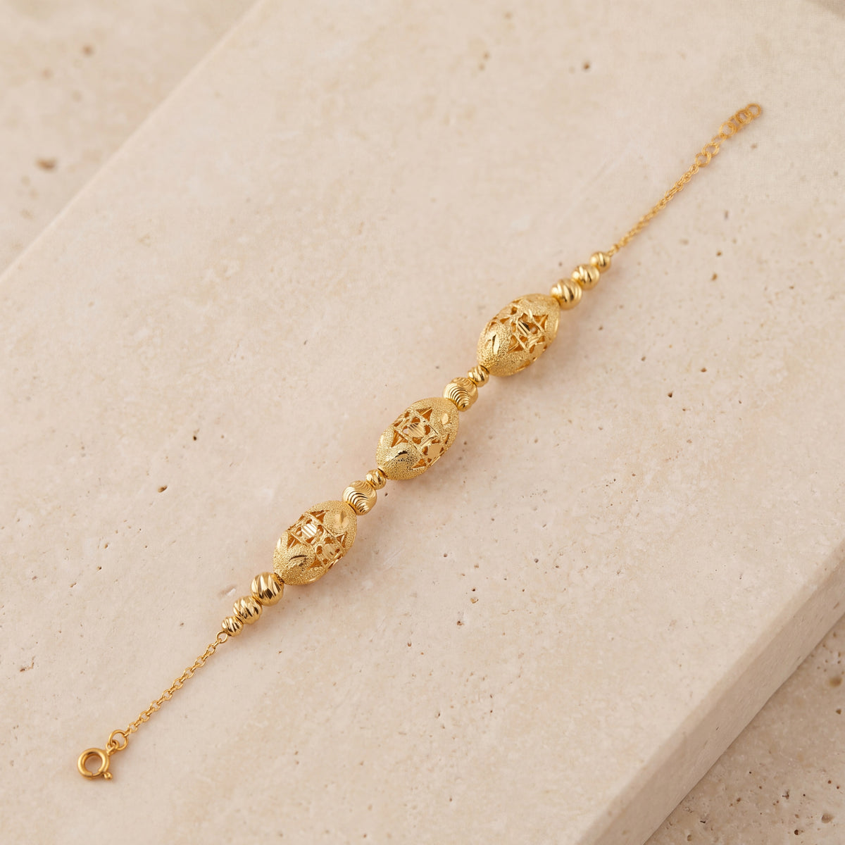 RP Beads & Ball Bracelet (D61) on travertine