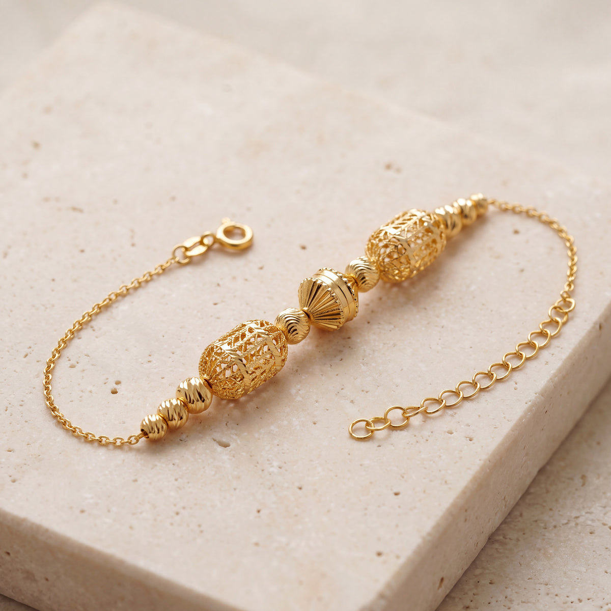 RP Beads & Ball Bracelet (D63) on travertine