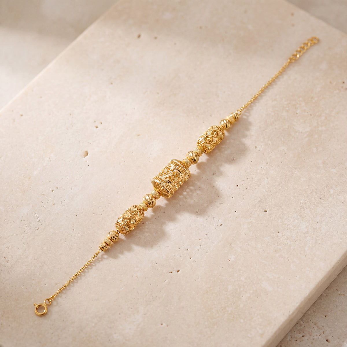 RP Beads & Ball Bracelet (D65) on travertine