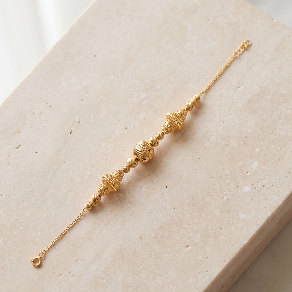 RP Beads & Ball Bracelet (D67) on travertine