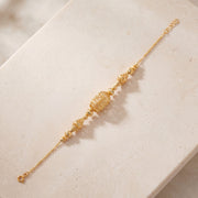 RP Beads & Ball Bracelet (D69) on travertine