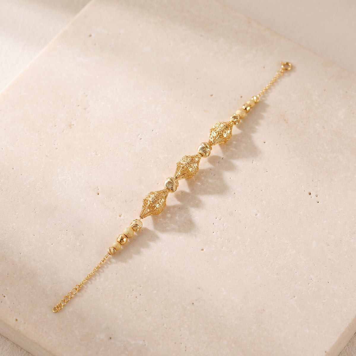 RP Beads & Ball Bracelet (D71) on travertine