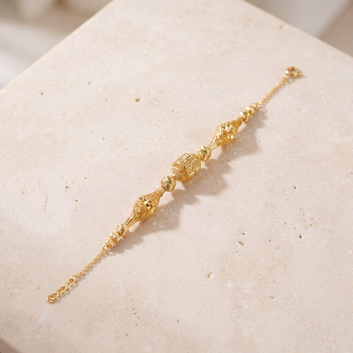 RP Beads & Ball Bracelet (D72) on travertine