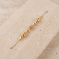 RP Beads & Ball Bracelet (D73) on travertine