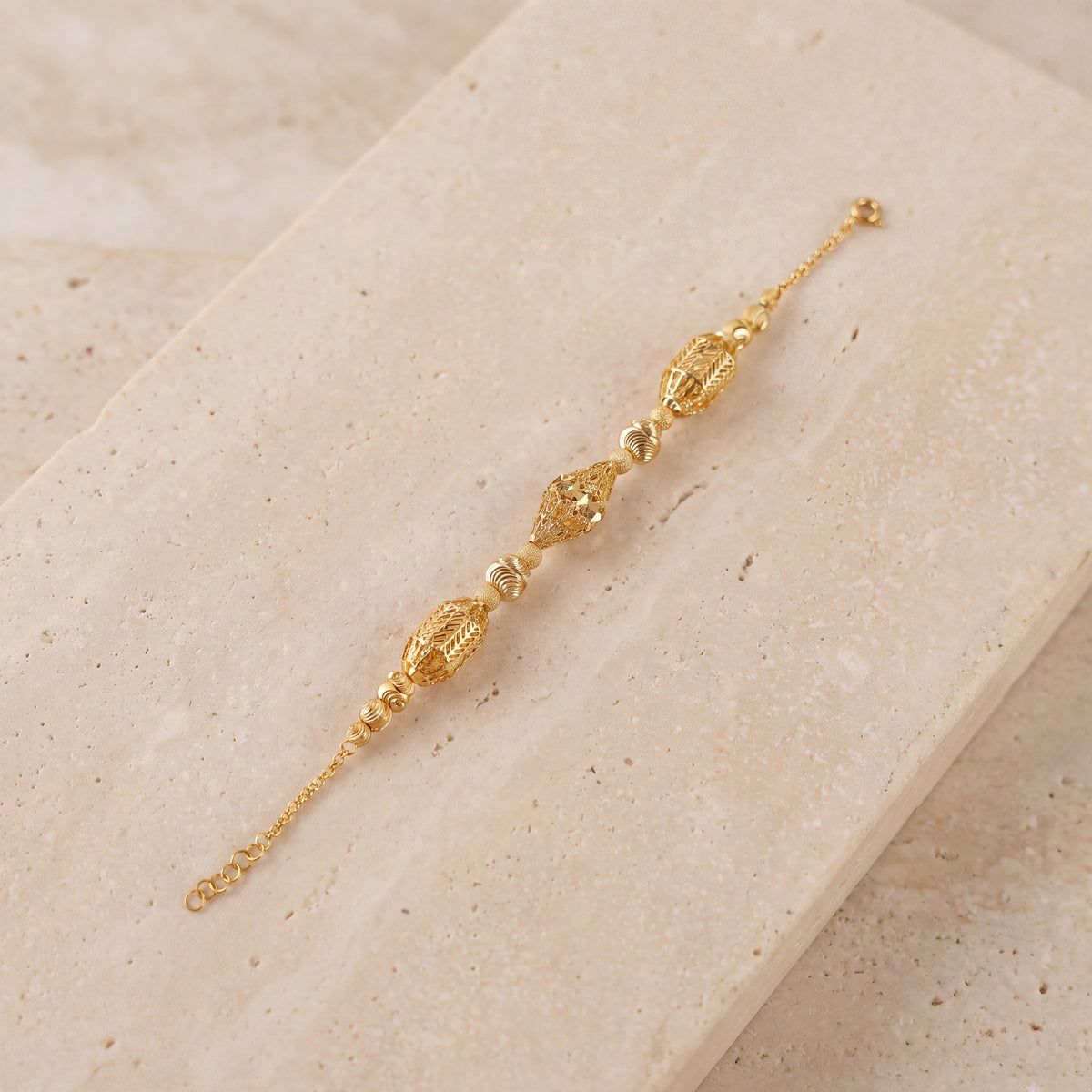 RP Beads & Ball Bracelet (D73) on travertine