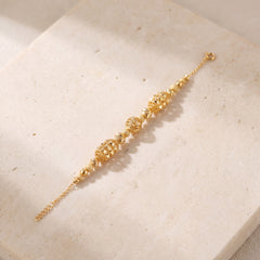 RP Beads & Ball Bracelet (D76) on travertine