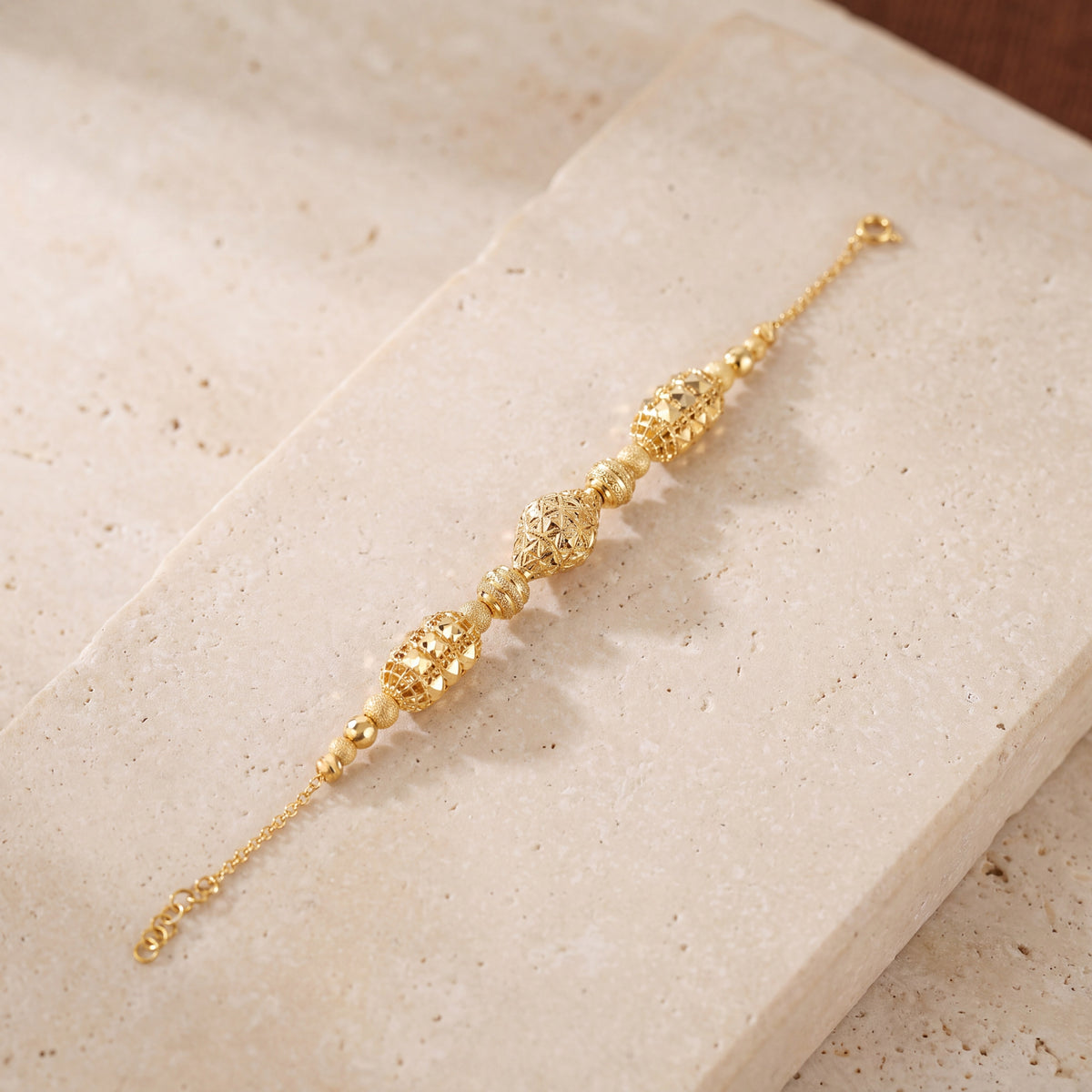 RP Beads & Ball Bracelet (D78) on travertine