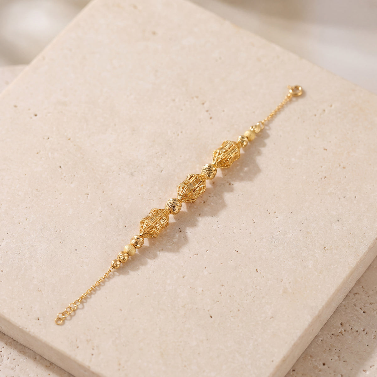 RP Beads & Ball Bracelet (D81) on travertine