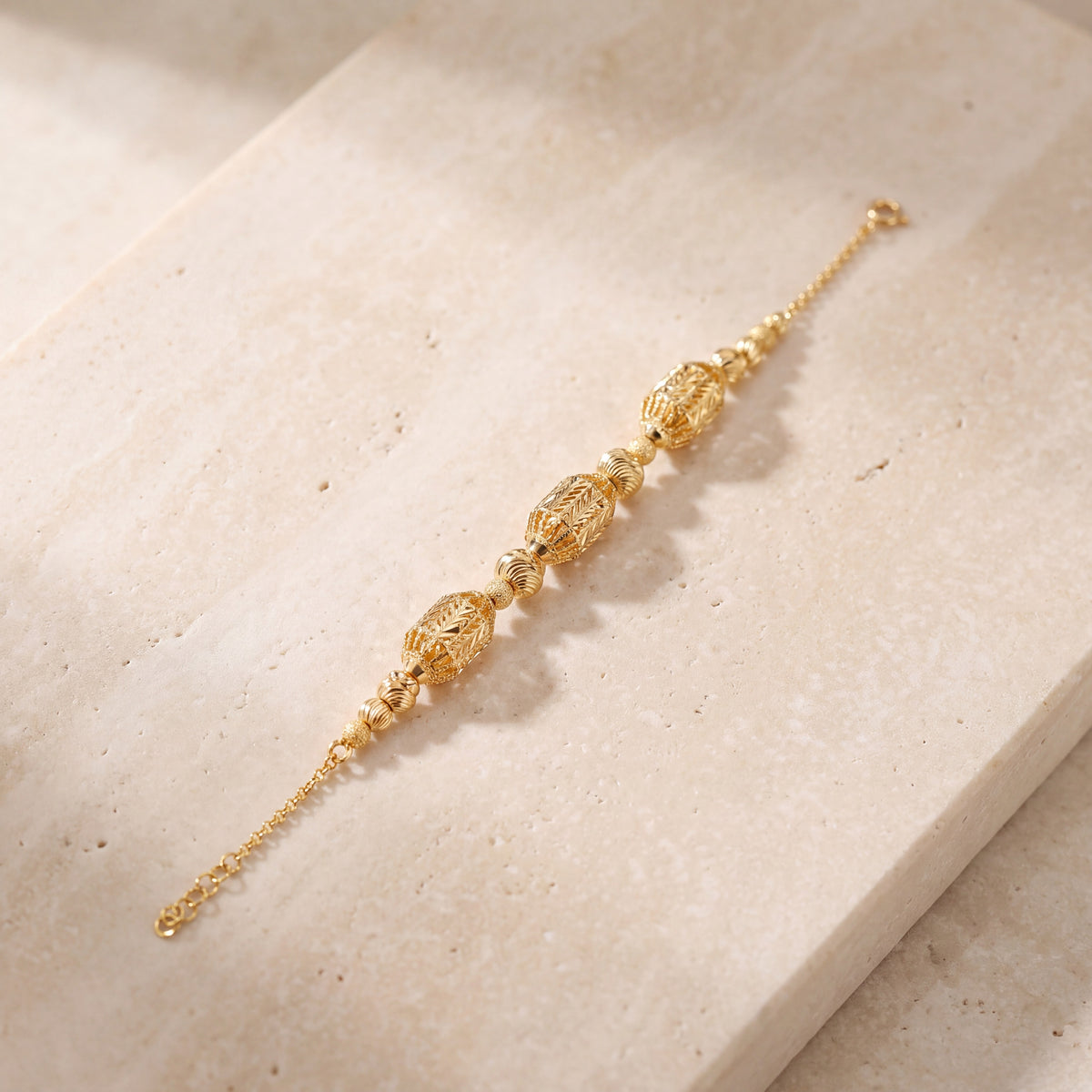 RP Beads & Ball Bracelet (D82) on travertine