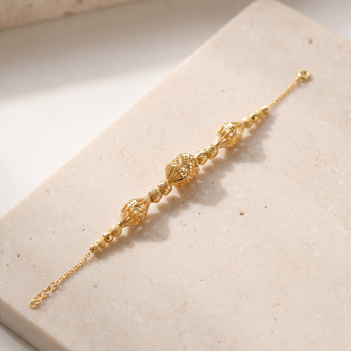 RP Beads & Ball Bracelet (D87) on travertine