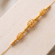 RP Beads & Ball Bracelet (D9) on travertine