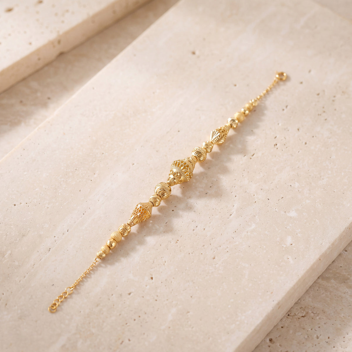 RP Beads & Ball Bracelet (D91) on travertine