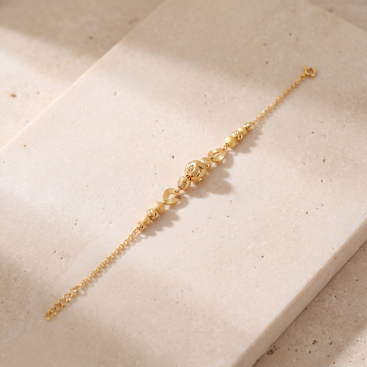 RP Beads & Ball Bracelet (D93) on travertine