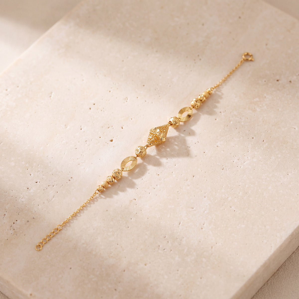 RP Beads & Ball Bracelet (D96) on travertine