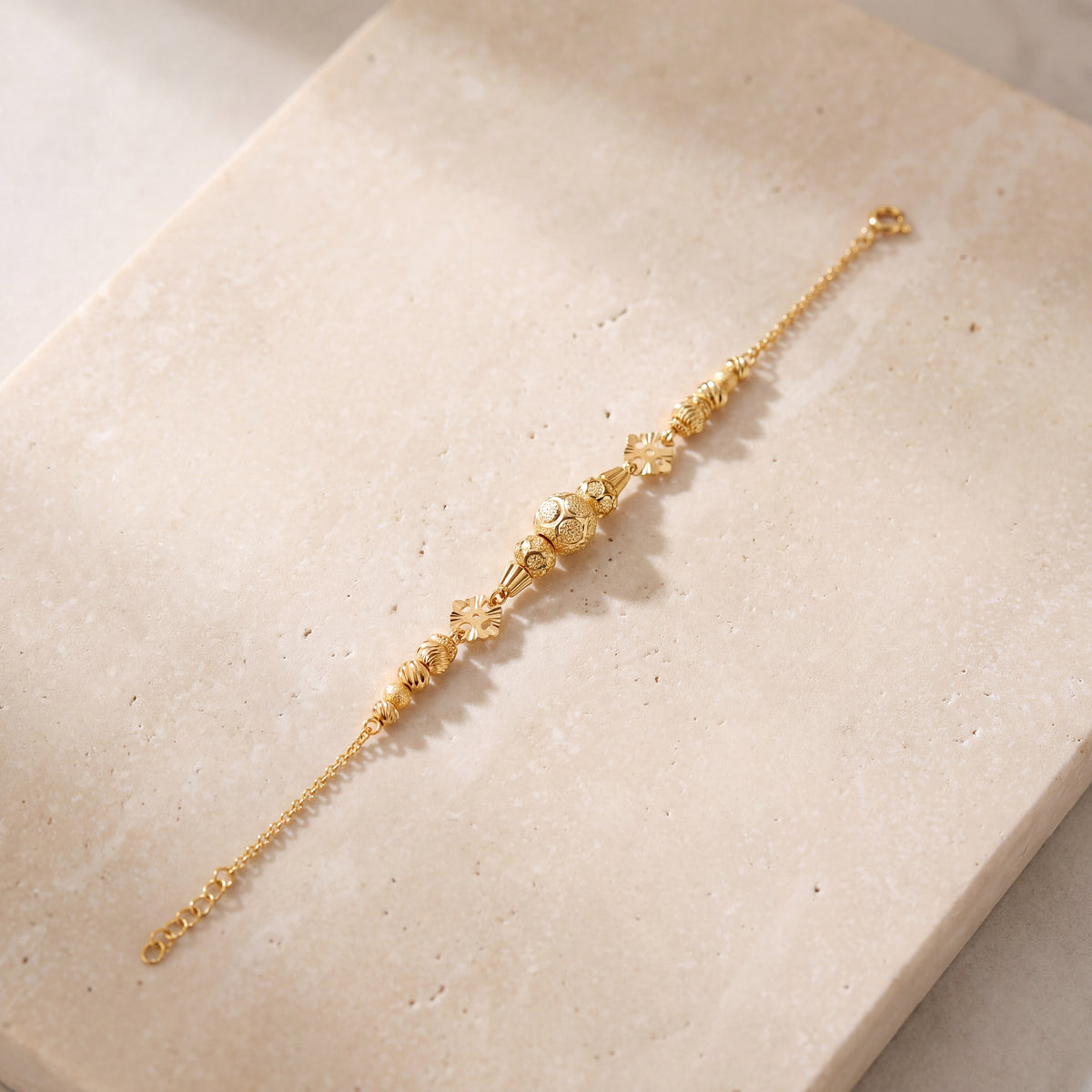 RP Beads & Ball Bracelet (D98) on travertine