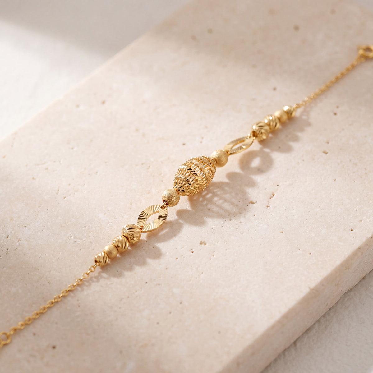 RP Beads & Ball Bracelet (D99) on travertine