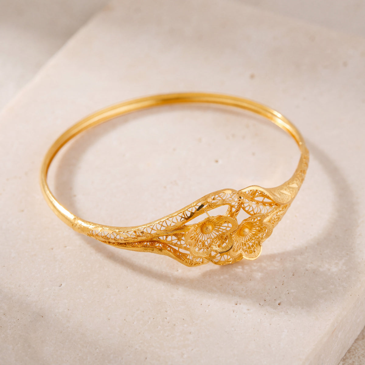 RP Cuff Bracelet (D16) on travertine
