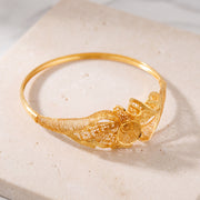 RP Cuff Bracelet (D27) on travertine