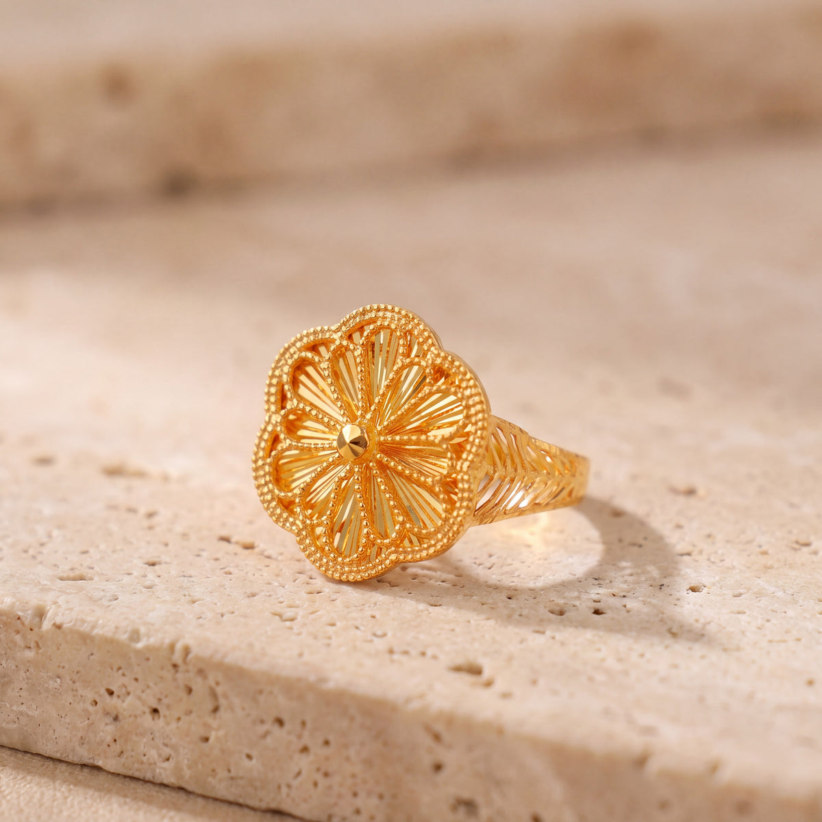 RP Diamond Cut Clover Ring (D1) on travertine