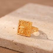 RP Diamond Cut Frame Ring (D1) on travertine