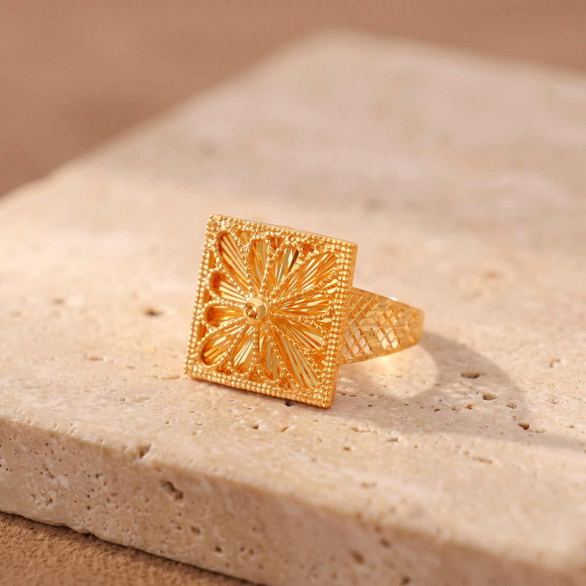 RP Diamond Cut Frame Ring (D1) on travertine