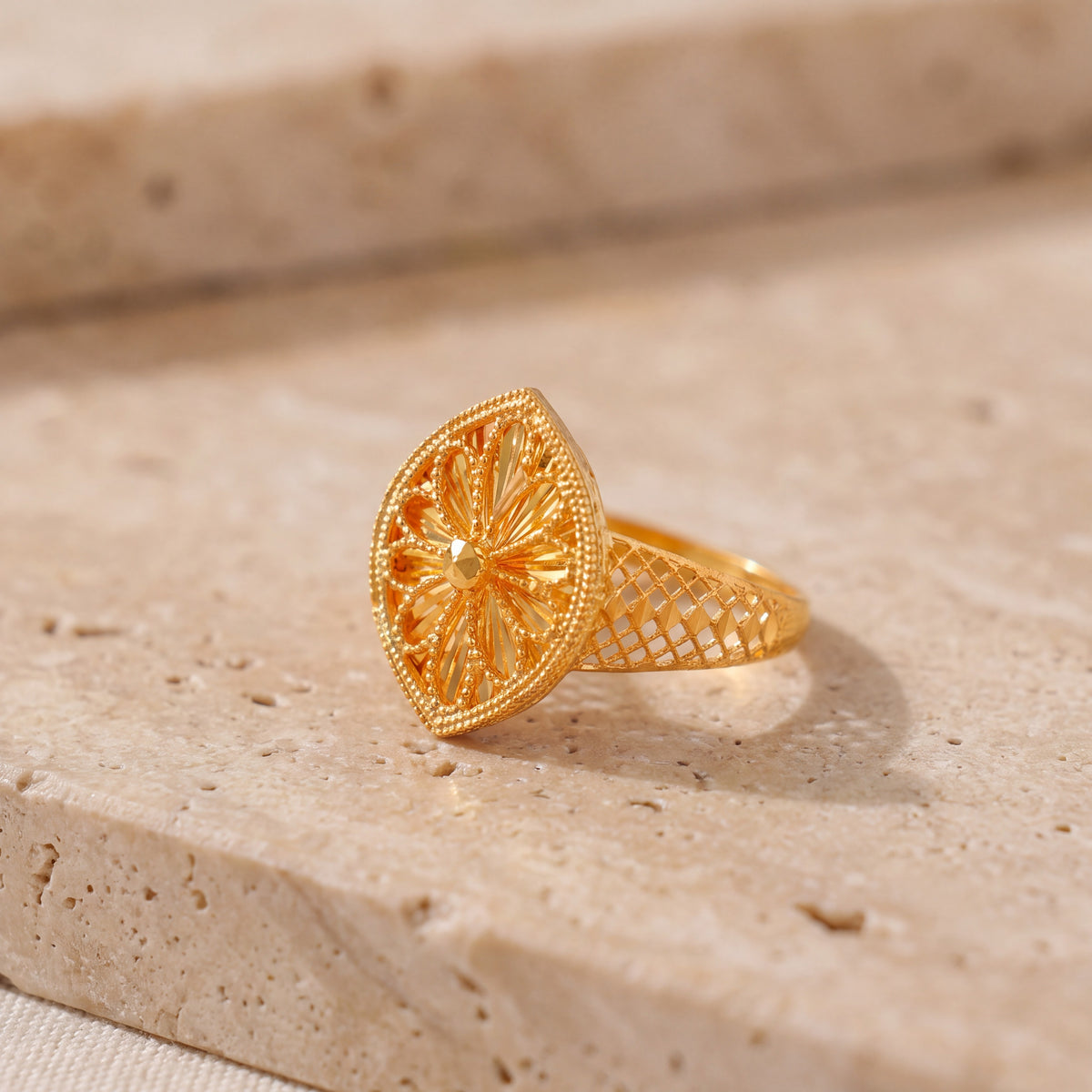 RP Diamond Cut Marquise Ring (D1) on travertine