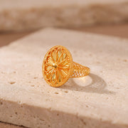 RP Diamond Cut Oval Ring (D1) on travertine