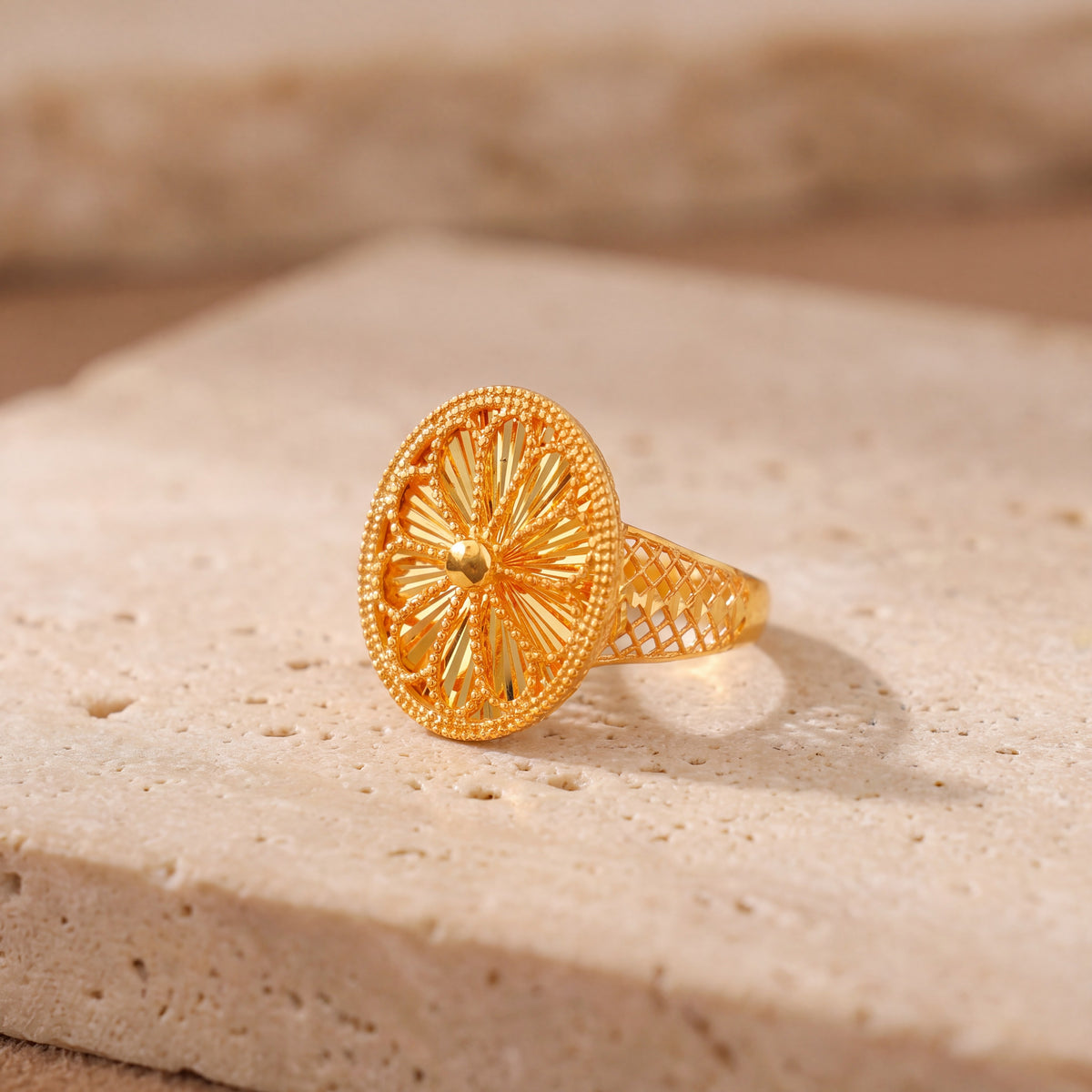 RP Diamond Cut Oval Ring (D1) on travertine