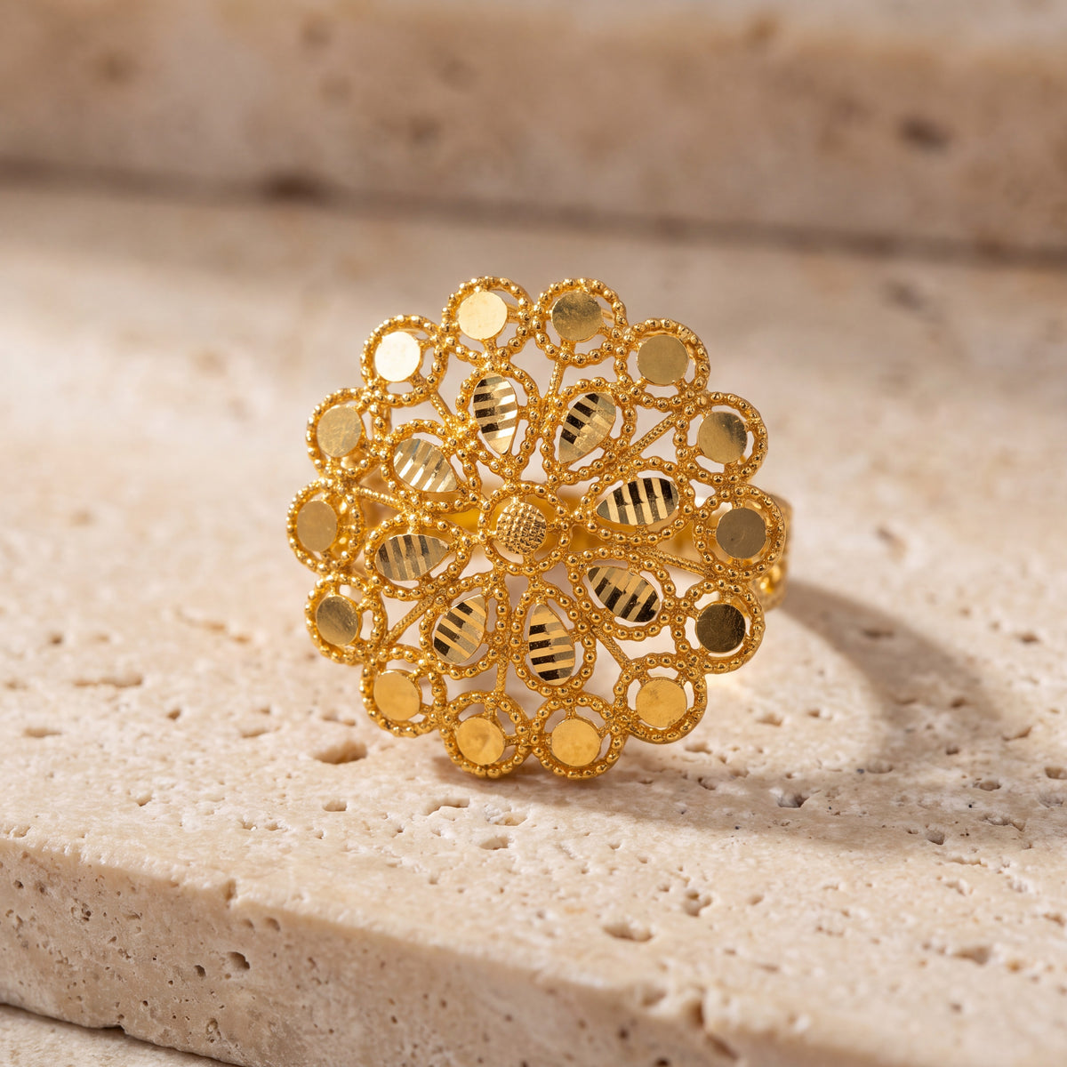 RP Flower Ring (D1) on travertine