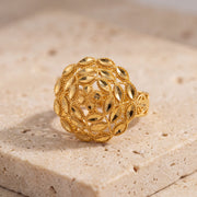 RP Flower Ring (D2) on travertine