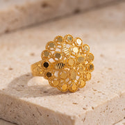 RP Flower Ring (D4) on travertine