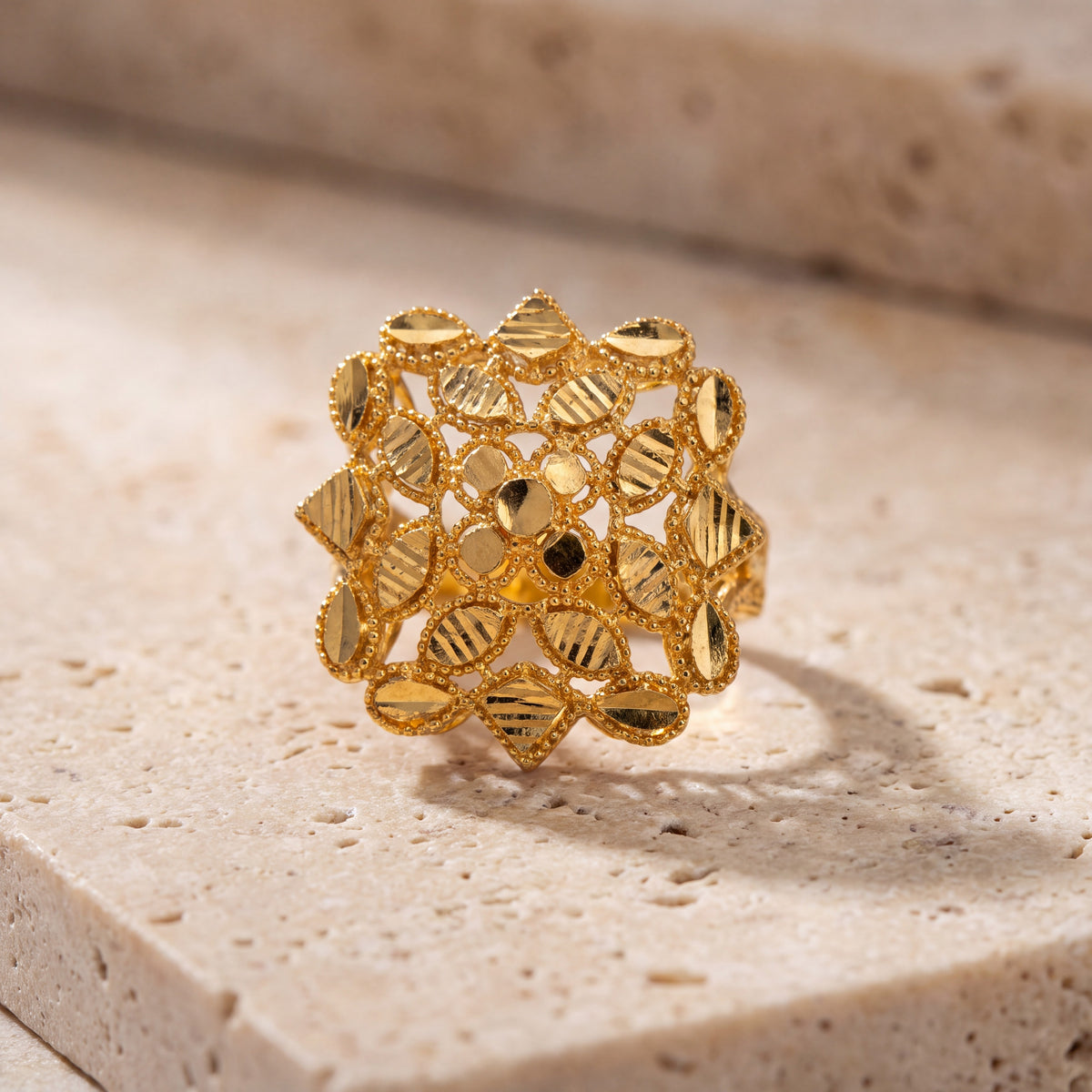 RP Flower Ring (D6) on travertine