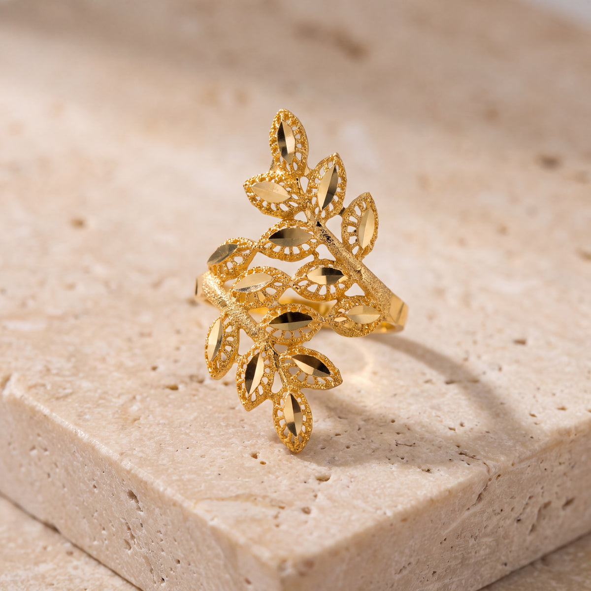 RP Leaf Ring (D1) on travertine