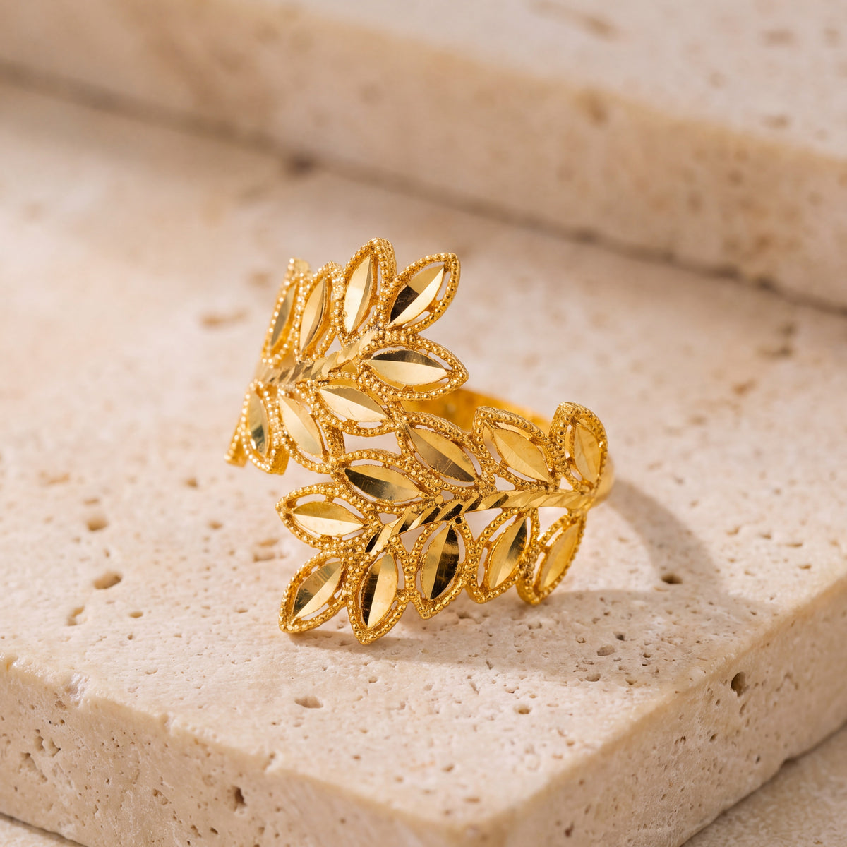 RP Leaf Ring (D3) on travertine