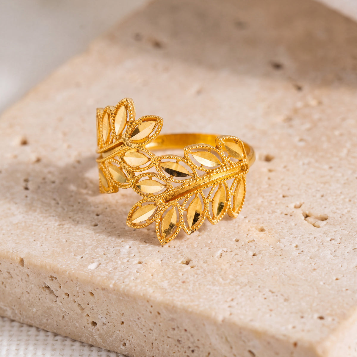 RP Leaf Ring (D4) on travertine