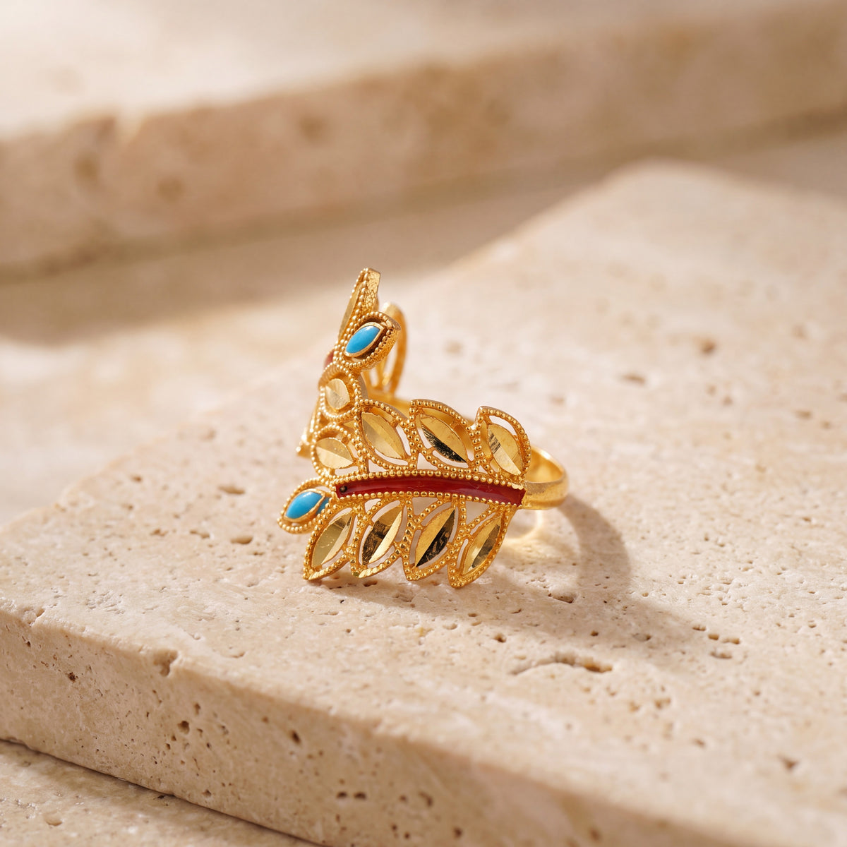 RP Leaf Ring (D8) on travertine