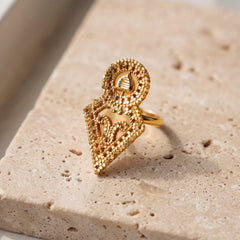 RP Shawahid Ring (D4) on travertine