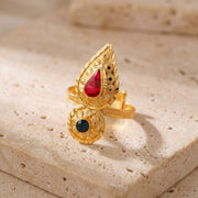 Shawahid Ring (D8) on travertine