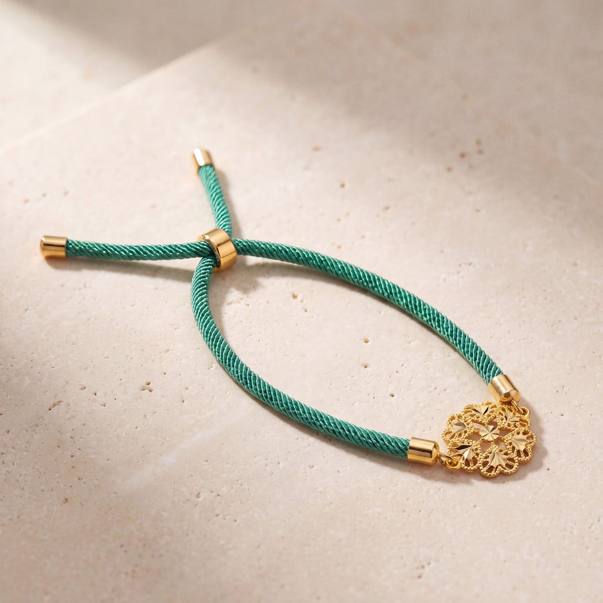 Snowflake Thread Bracelet on travertine